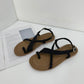 Glenda Roman Cross Sandals (Black)